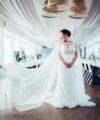 Second Hand Brautkleid Designer Aaliyah Quinn über Wed2Be gekauft Remi Meerjungfrau Gr. 40 Foto 1